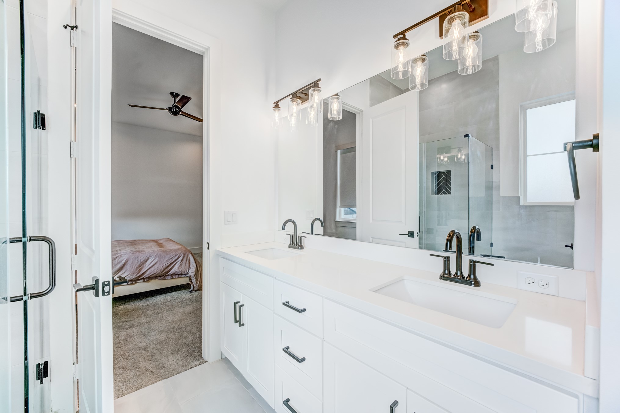 107 West Whitney Street, Unit E Houston, TX 77018 - Photo 35 of 48 a bathroom with a sink double vanity and shower