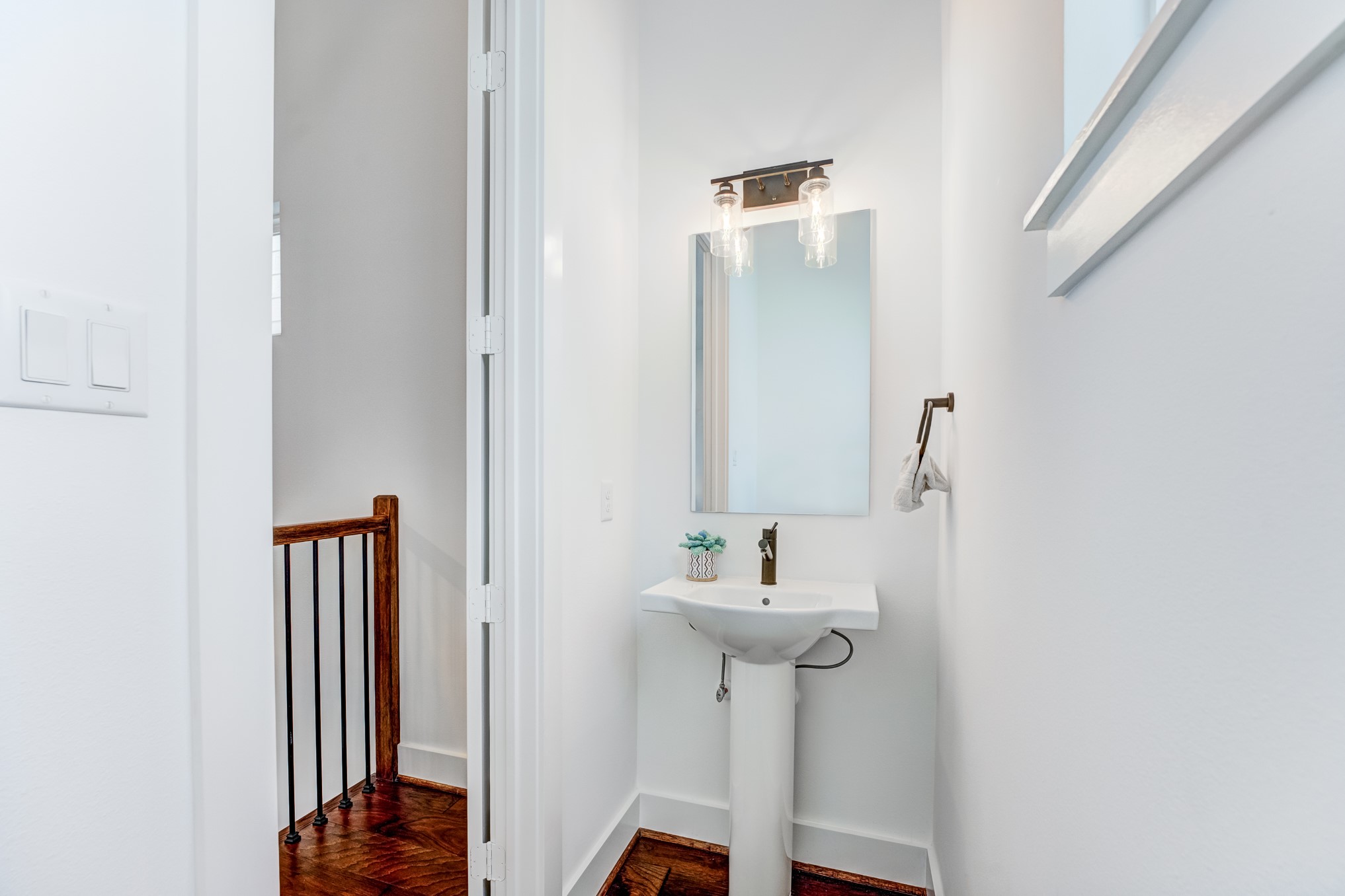 107 West Whitney Street, Unit E Houston, TX 77018 - Photo 45 of 48 a bathroom with a sink and a mirror