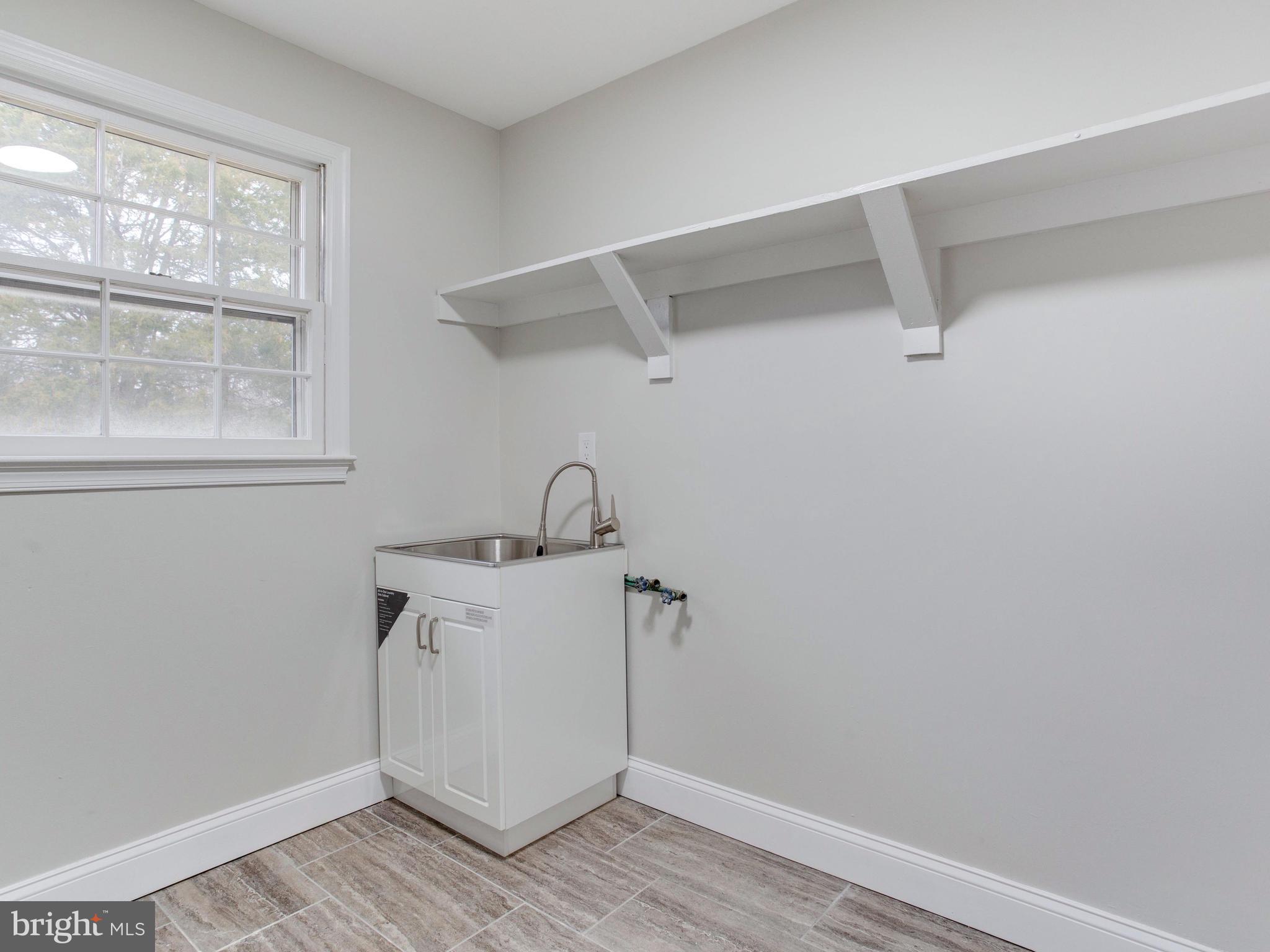 6804 Burch Hill Road Brandywine, MD 20613 - Photo 7 of 37 Laundry room