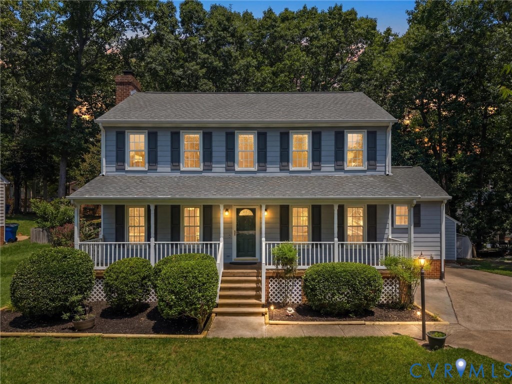 3524 Ludgate Road Chester, VA 23831 - Photo 1 of 44 Prominent front porch with white railings, a gray