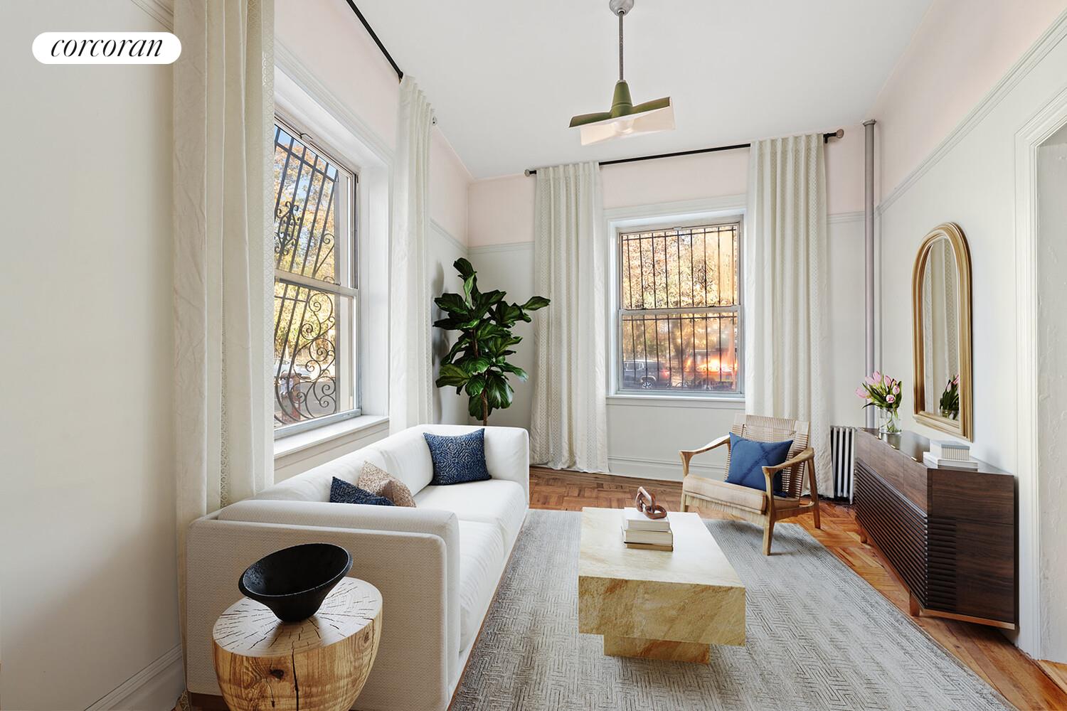a living room with furniture and a window