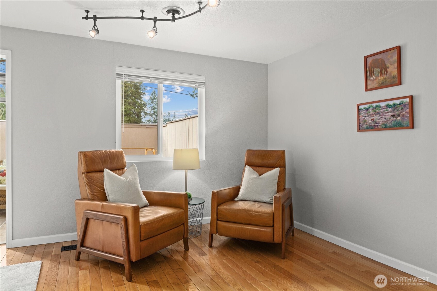 8225 212th Street Southwest, Unit 304 Edmonds, WA 98026 - Photo 19 of 35 a living room with furniture and a window