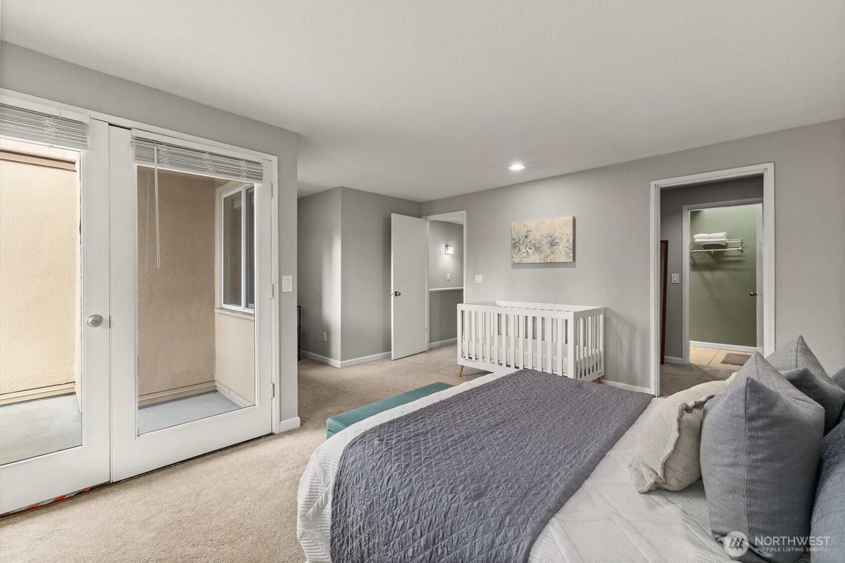 8225 212th Street Southwest, Unit 304 Edmonds, WA 98026 - Photo 26 of 35 a bedroom with a bed and a window