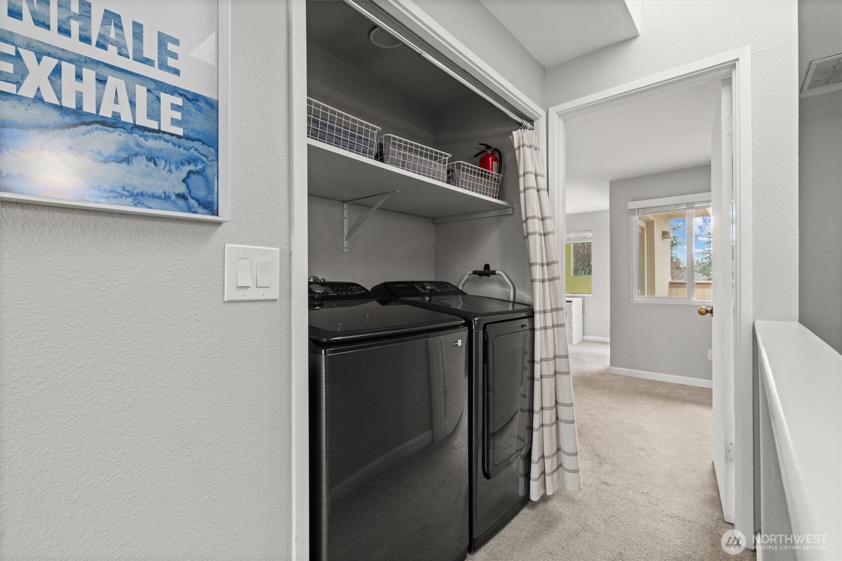 8225 212th Street Southwest, Unit 304 Edmonds, WA 98026 - Photo 29 of 35 a utility room with washer and dryer