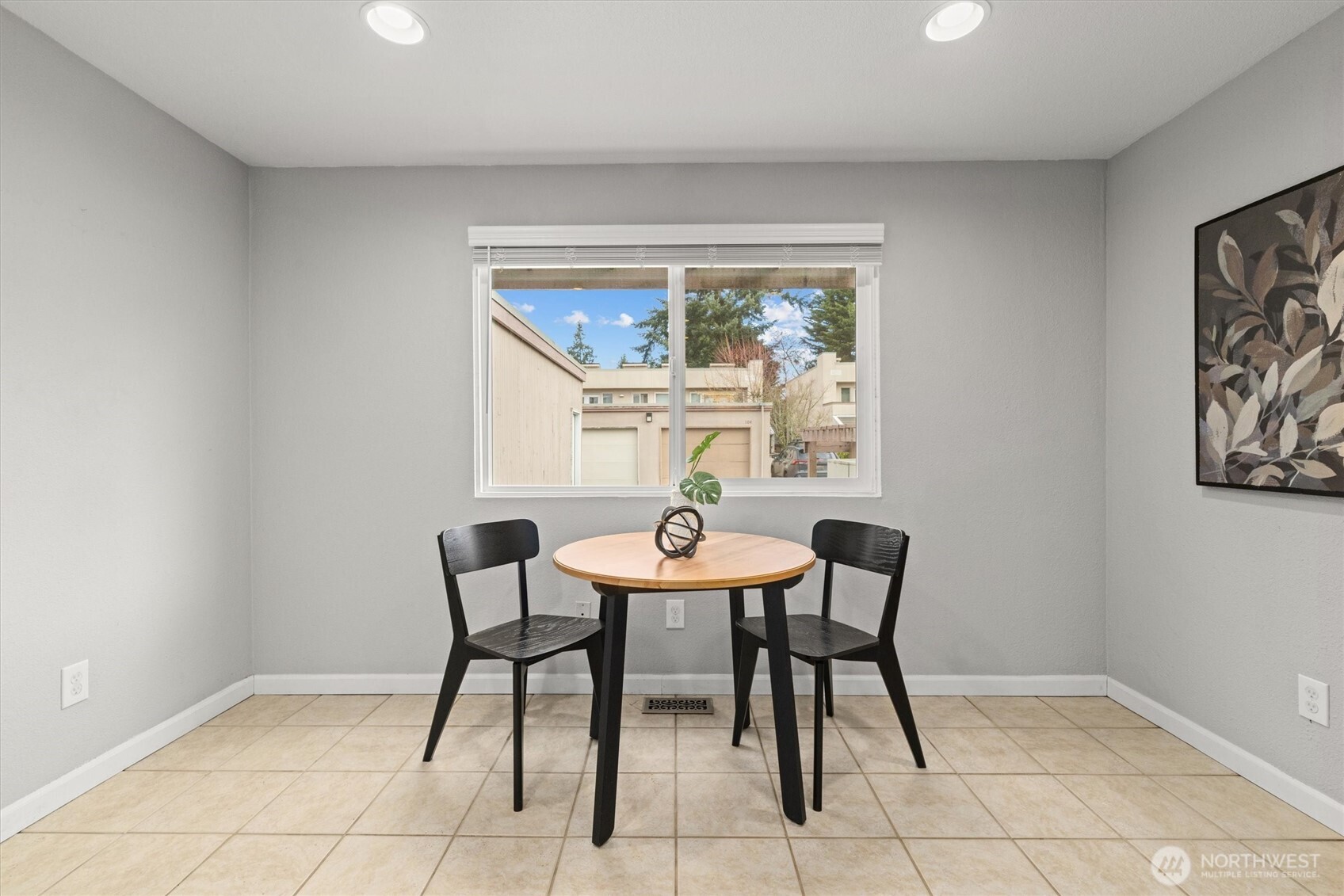 8225 212th Street Southwest, Unit 304 Edmonds, WA 98026 - Photo 7 of 35 a dining room with furniture and window