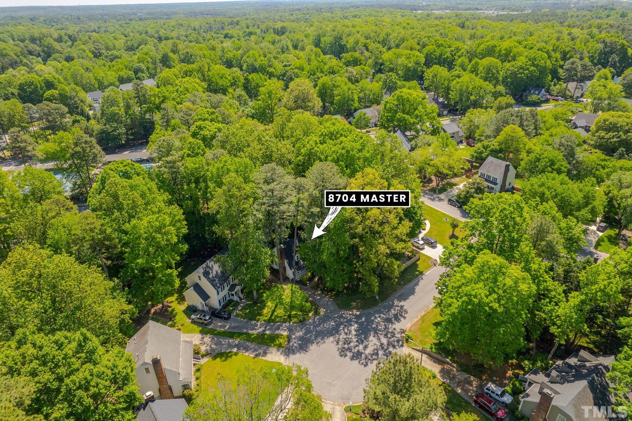 8704 Master Court Raleigh, NC 27615 - Photo 13 of 20 a view of a yard with plants