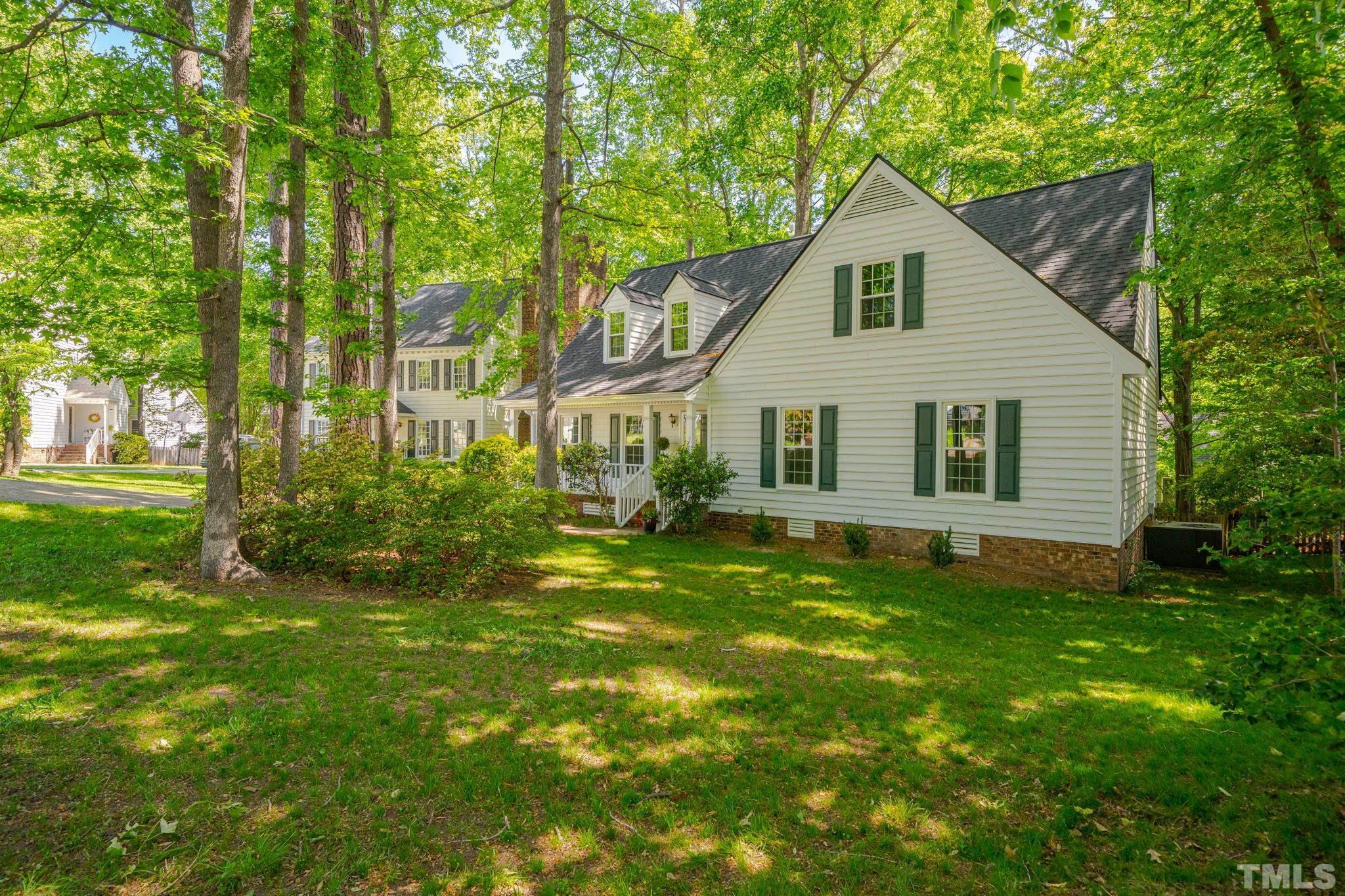 8704 Master Court Raleigh, NC 27615 - Photo 4 of 20 a view of a house with a yard