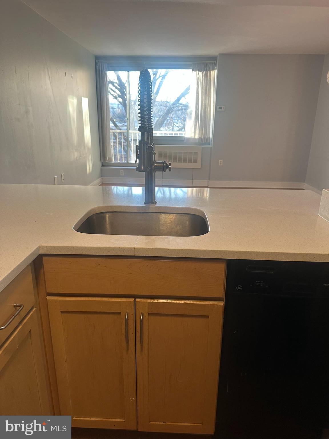 800 4th Street Southwest, Unit S325 Washington, DC 20024 - Photo 10 of 17 a kitchen with a sink and large window