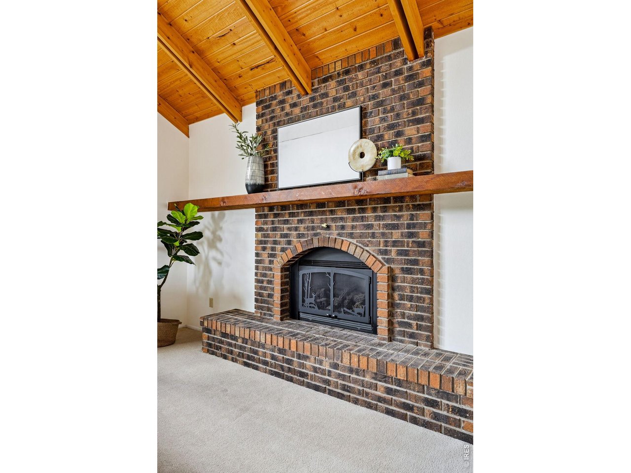 607 North Cedar Brook Road Boulder, CO 80304 - Photo 11 of 36 Main living room gas fireplace and extended mantel