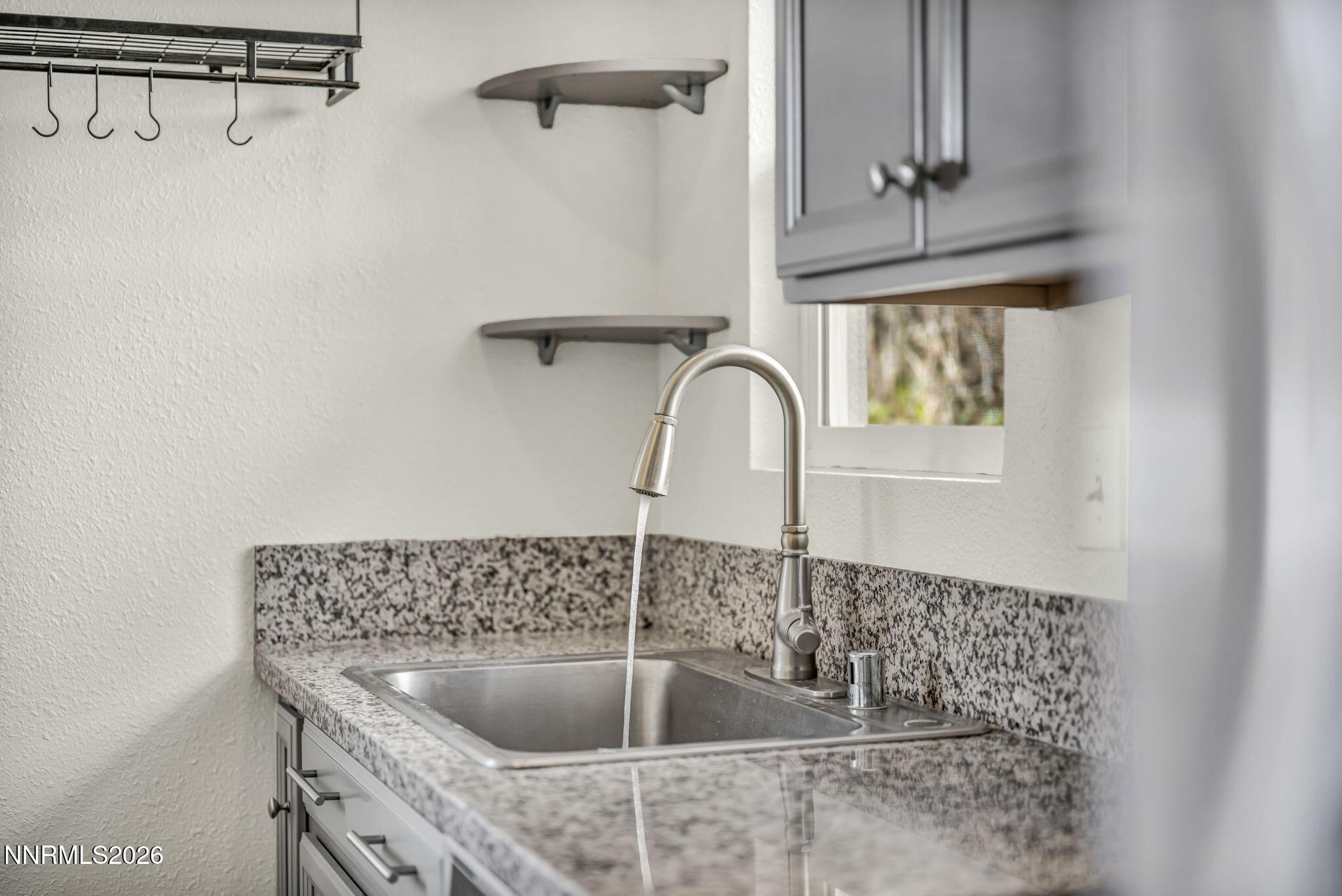 7575 Halifax Drive Reno, NV 89506 - Photo 12 of 58 a close view of sink and tap