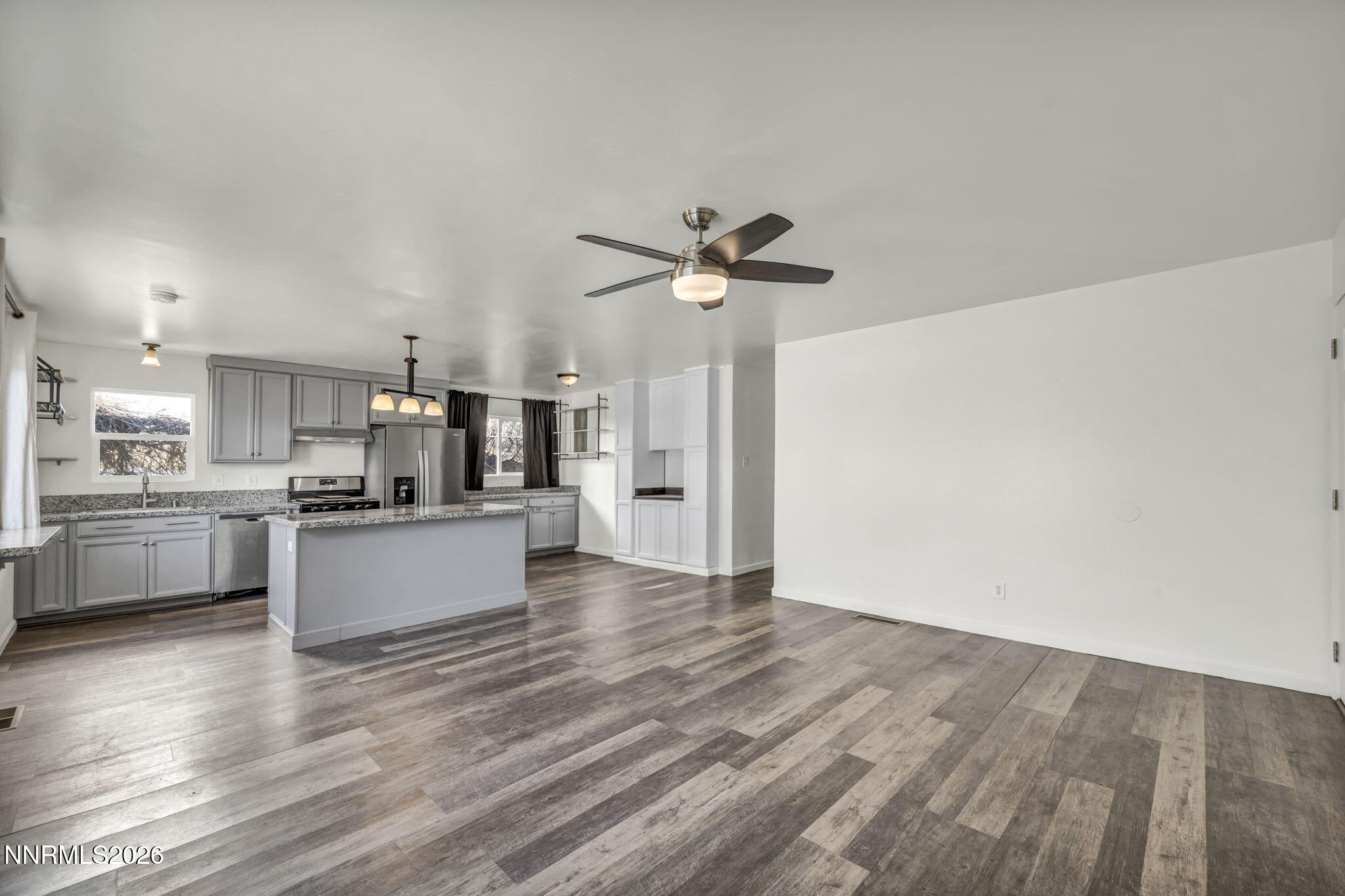 7575 Halifax Drive Reno, NV 89506 - Photo 9 of 58 a view of kitchen with sink microwave and refrigerator