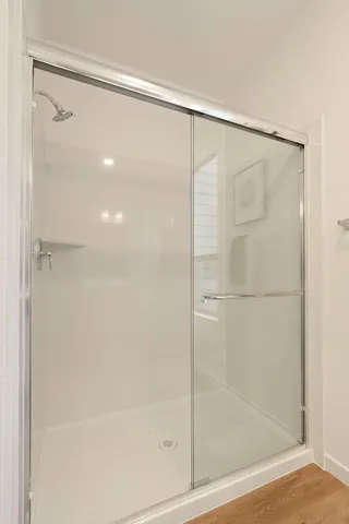 a view of an empty room with a garage