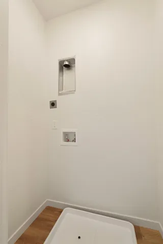 a view of a terrace with furniture and wooden fence