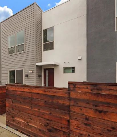 a front view of a house with stairs