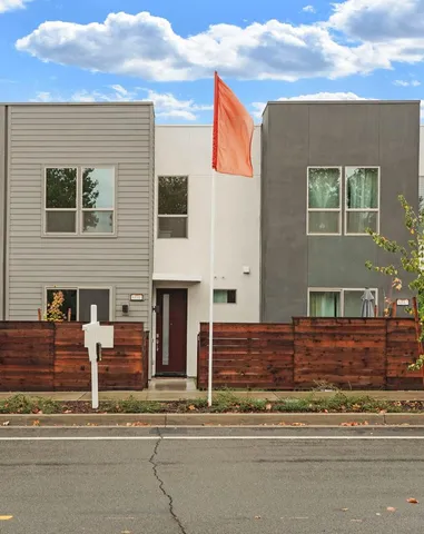 a view of a house with a yard porch and sitting area