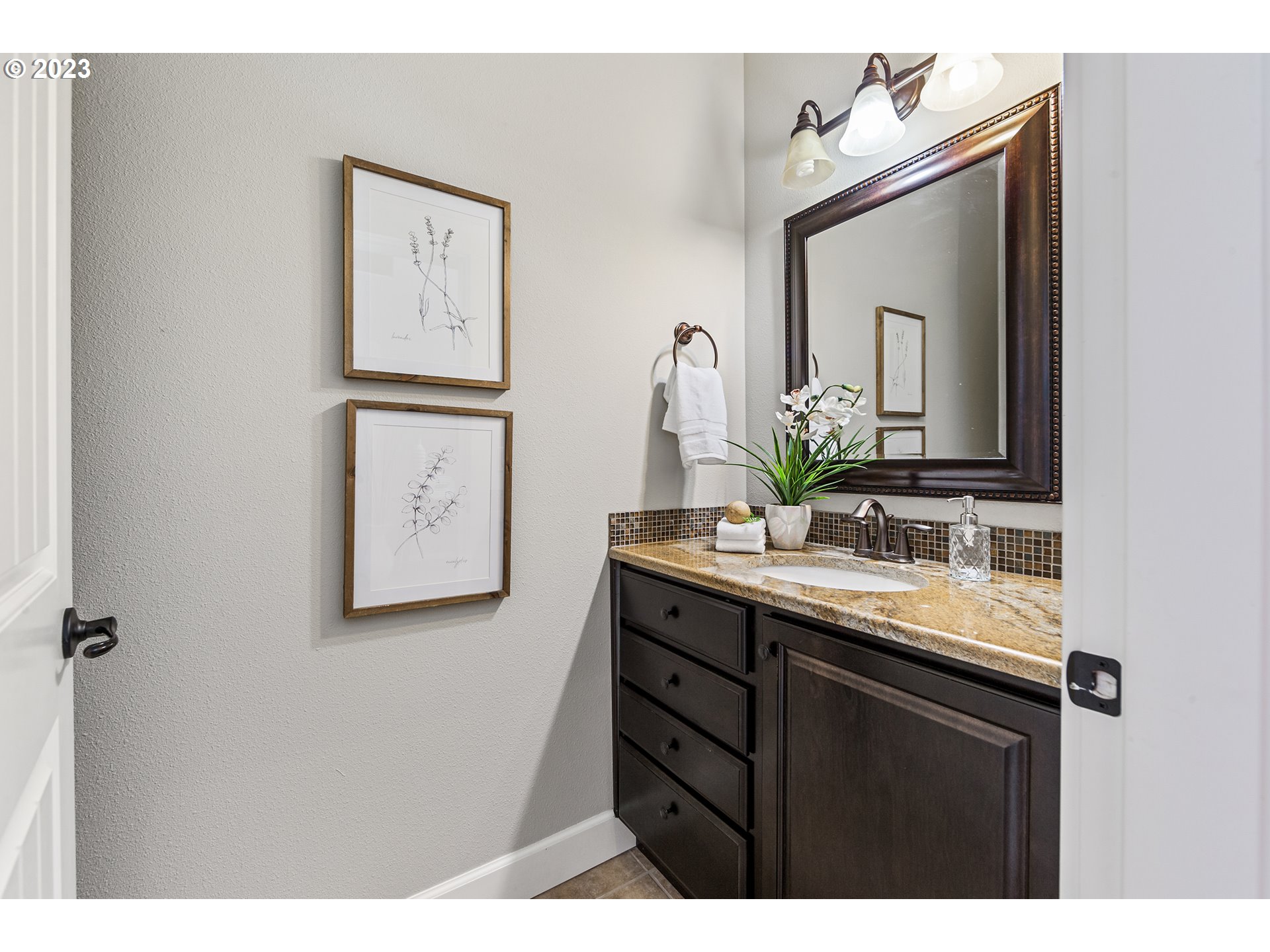 5316 Southwest Childs Road Lake Oswego, OR 97035 - Photo 26 of 42 a bathroom with a toilet sink and mirror