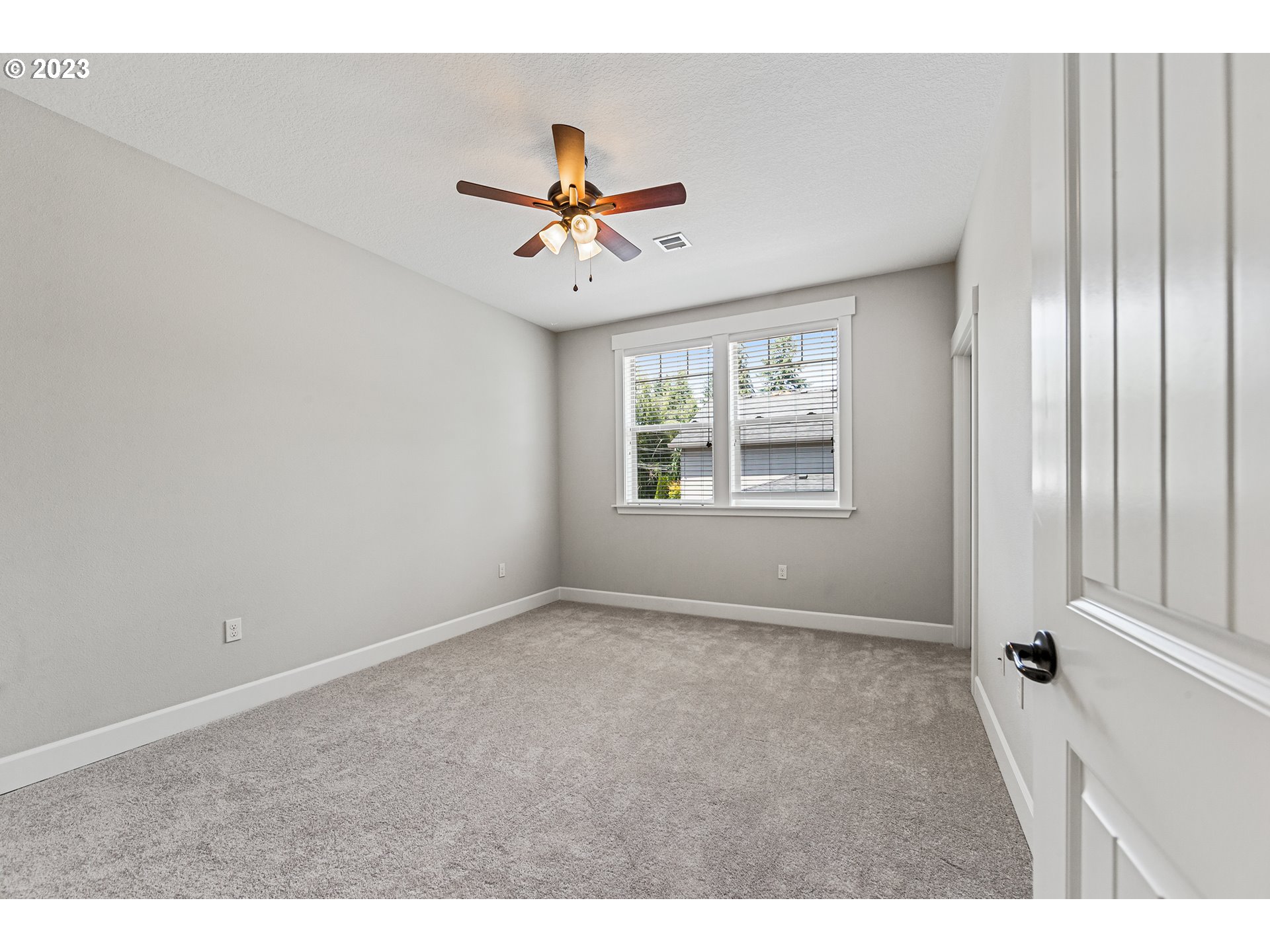 5316 Southwest Childs Road Lake Oswego, OR 97035 - Photo 31 of 42 a view of an empty room with a window