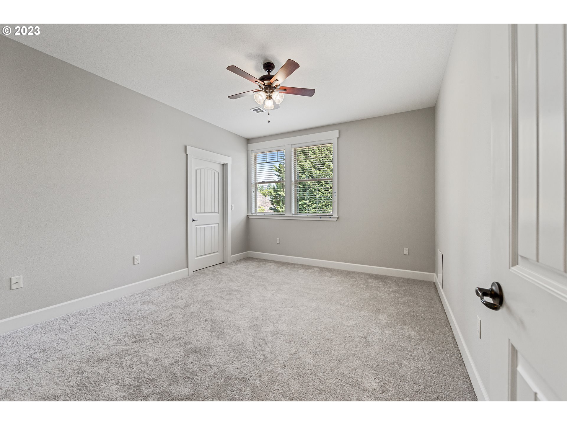 5316 Southwest Childs Road Lake Oswego, OR 97035 - Photo 32 of 42 a view of an empty room with a window
