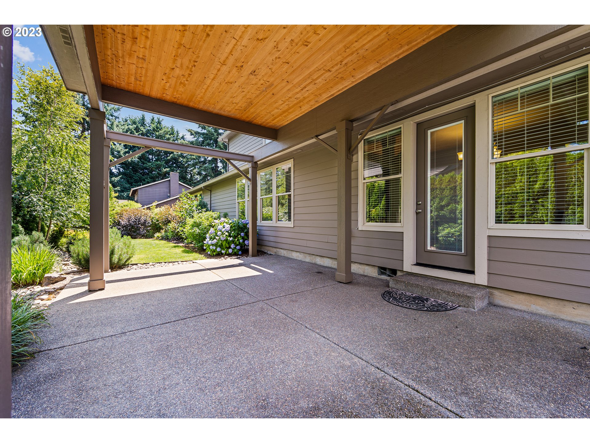 5316 Southwest Childs Road Lake Oswego, OR 97035 - Photo 4 of 42 a view of a house with a garden