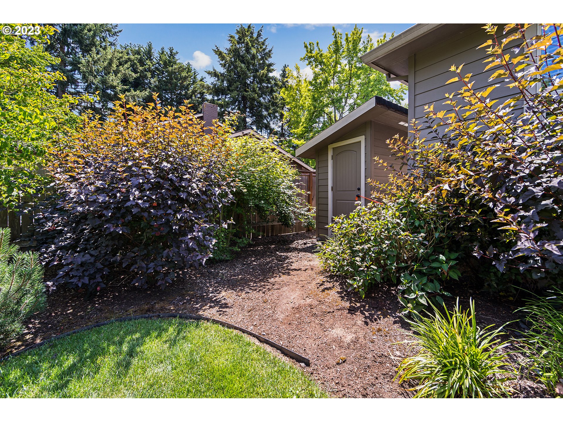 5316 Southwest Childs Road Lake Oswego, OR 97035 - Photo 41 of 42 a view of backyard with plants and outdoor seating