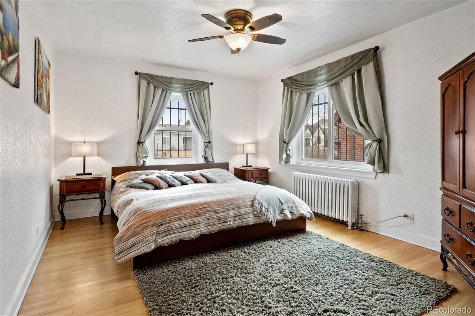 2995 Albion Street Denver, CO 80207 - Photo 18 of 40 a bedroom with a bed and a window