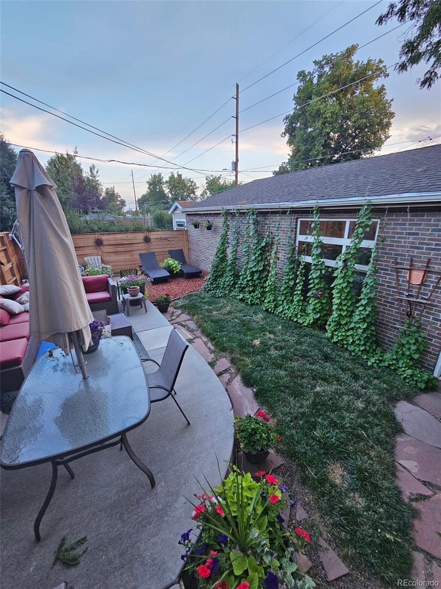 2995 Albion Street Denver, CO 80207 - Photo 40 of 40 a garden view with a seating space