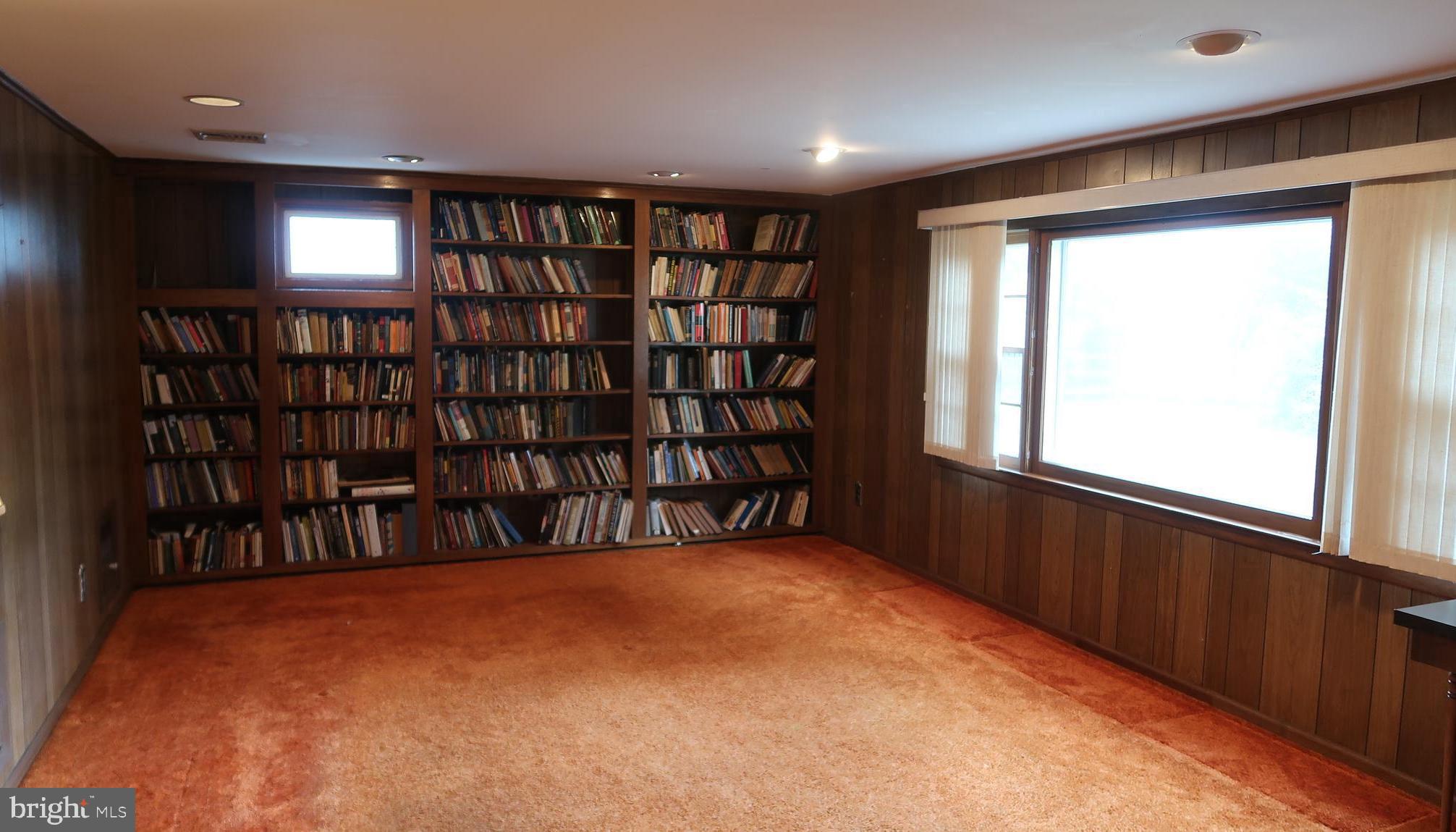 207 Fairfield Drive Wallingford, PA 19086 - Photo 16 of 28 Family Room With Built In Boookcase Wall