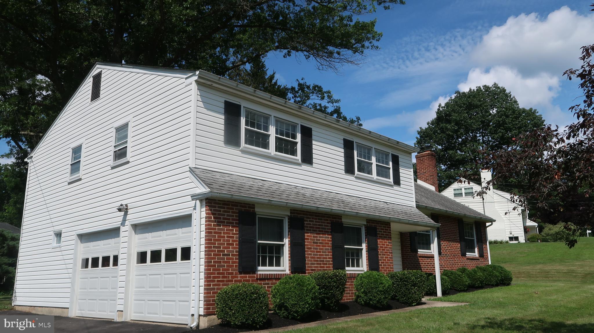 207 Fairfield Drive Wallingford, PA 19086 - Photo 3 of 28 Side View With 2 Car Attached Garage