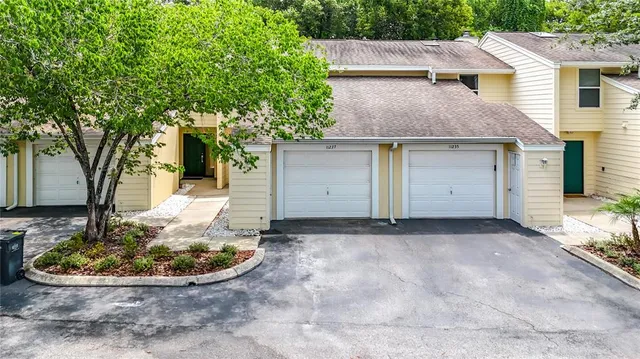 a view of a house with a sink and yard