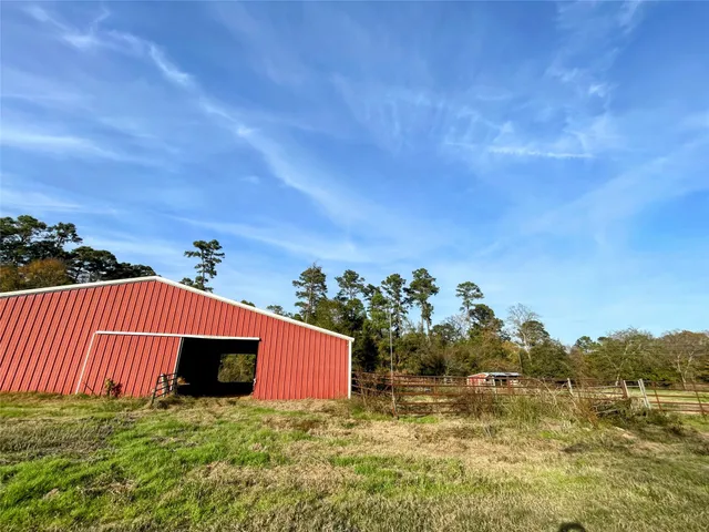 a view of a lake with houses in the back