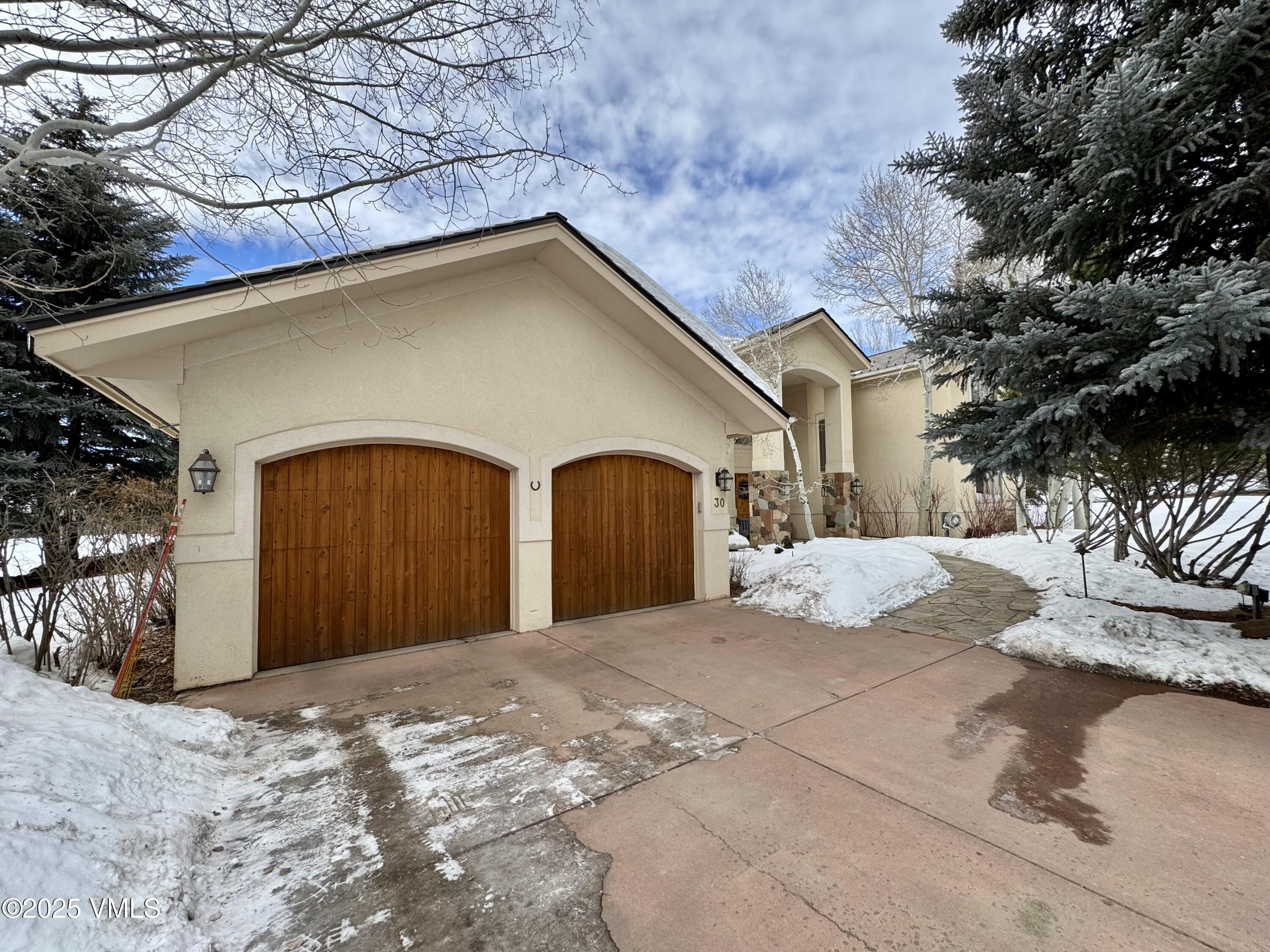 30 Shotgun Circle Edwards, CO 81632 - Photo 12 of 13 a view of a backyard with a large tree