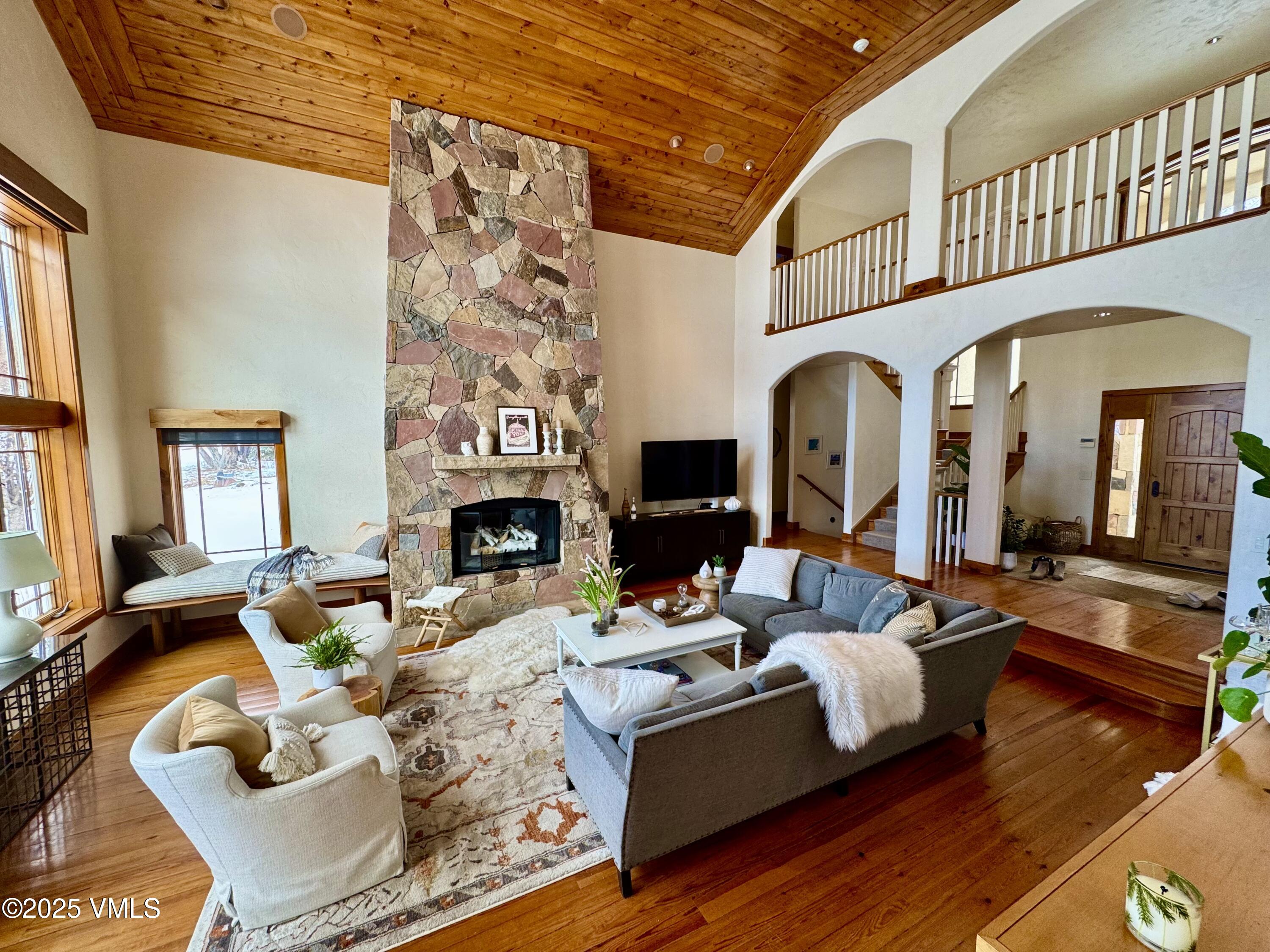 30 Shotgun Circle Edwards, CO 81632 - Photo 3 of 13 a living room with fireplace furniture or couch and a fireplace