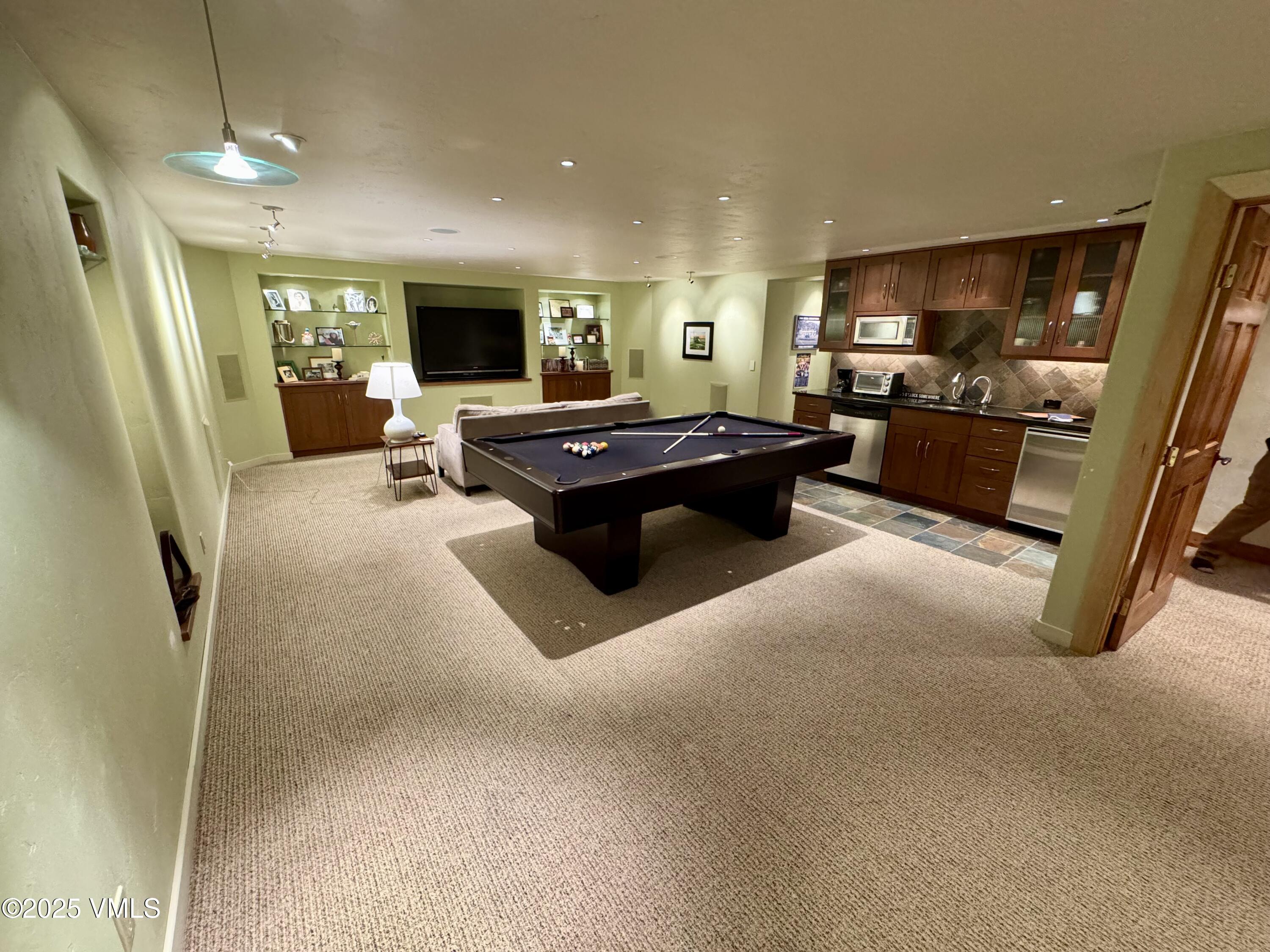 30 Shotgun Circle Edwards, CO 81632 - Photo 9 of 13 a living room with furniture and a flat screen tv