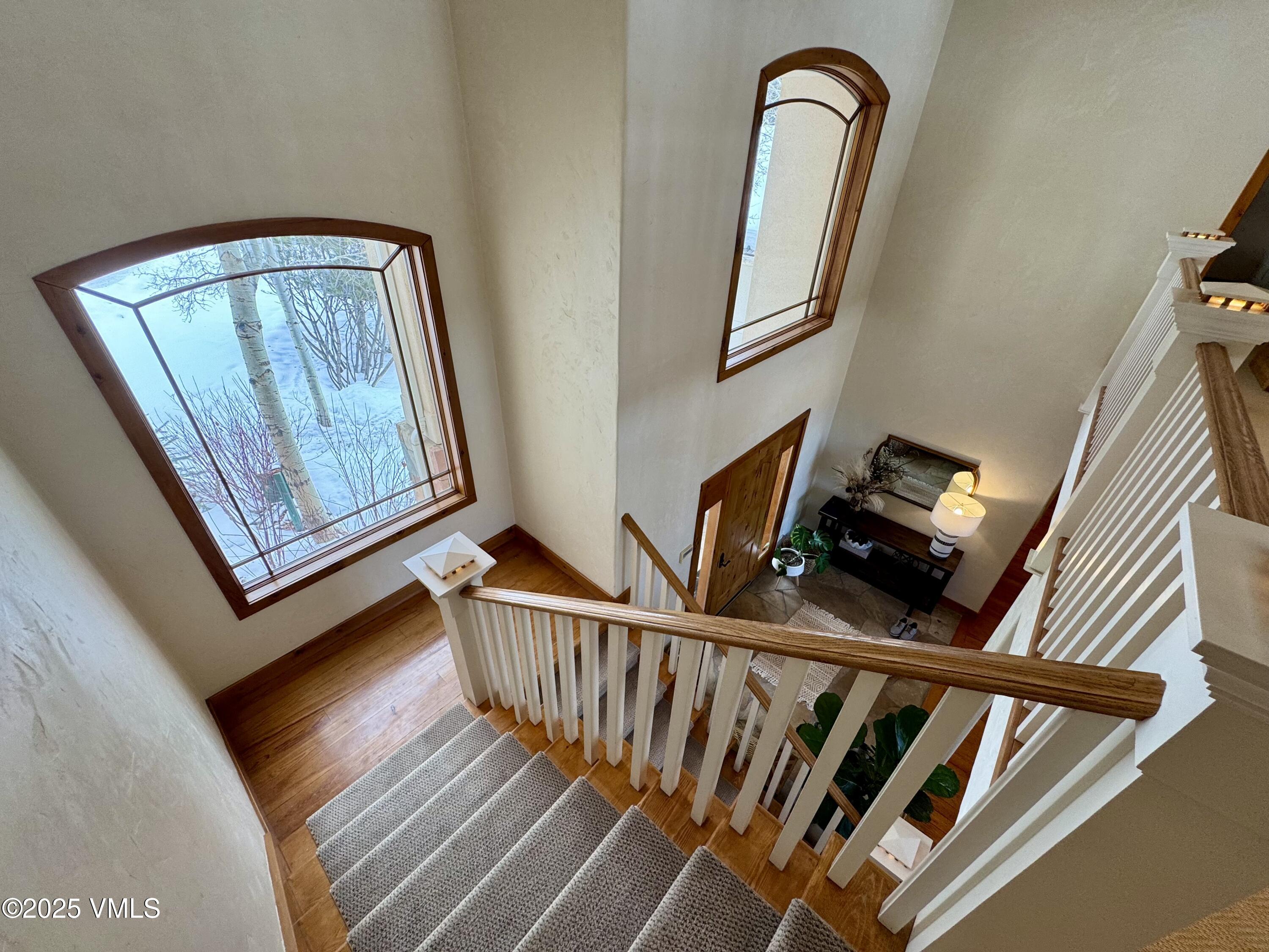 30 Shotgun Circle Edwards, CO 81632 - Photo 10 of 13 a view of staircase with wooden floor and stairs