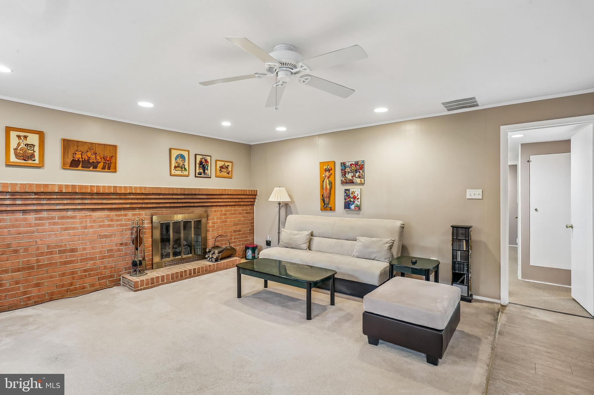 2 Foxhall Court Silver Spring, MD 20906 - Photo 53 of 86 a living room with furniture and a fireplace