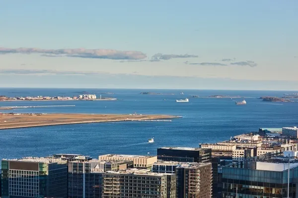 a view of a city with an ocean view
