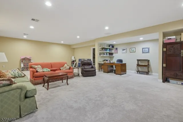 a living room with furniture and a couch