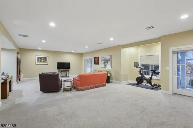 a bedroom with furniture and a couch