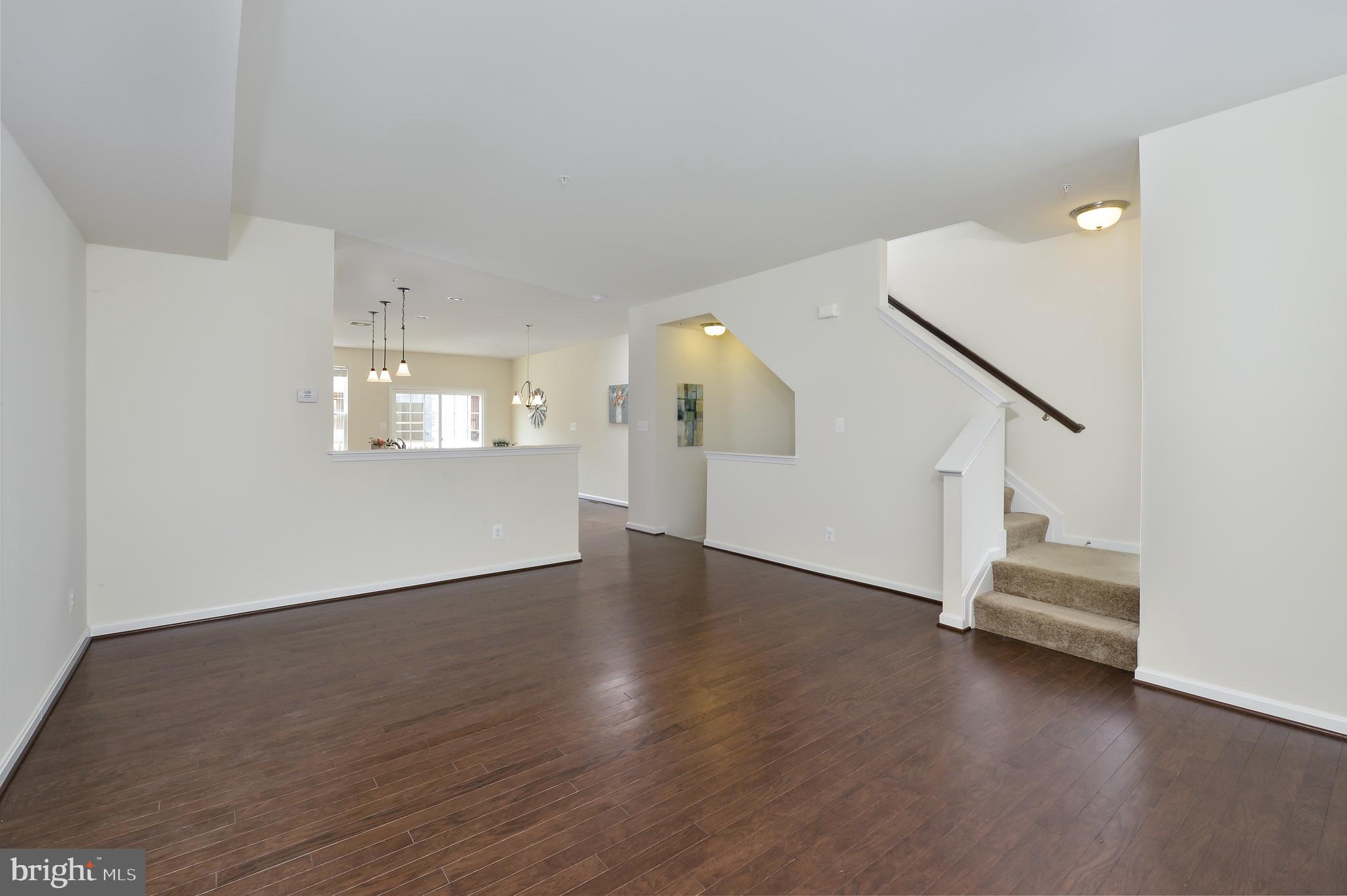 135 Hermans Way North East, MD 21901 - Photo 11 of 20 Living room opening to kitchen