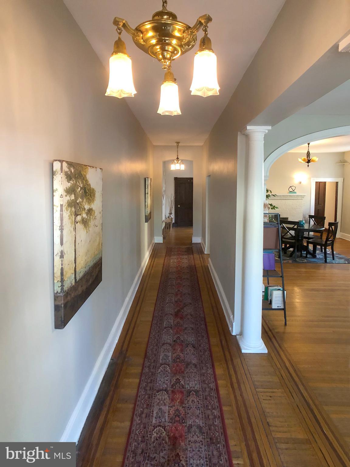 Grand entry hall with original lighting
