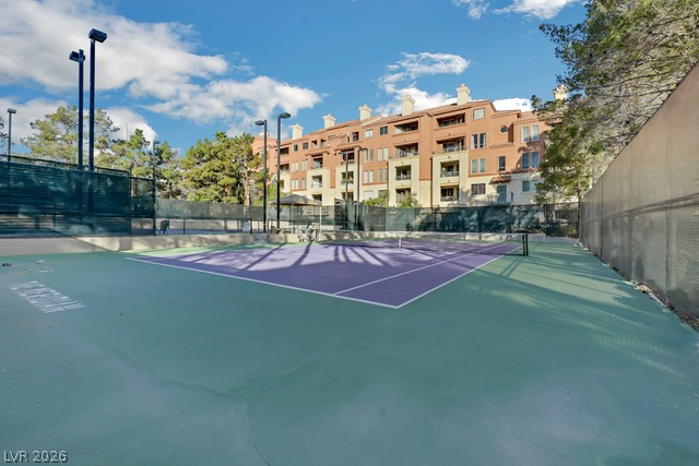 230 East Flamingo Road, Unit 435 Las Vegas, NV 89169 - Photo 14 of 15 An inviting tennis court awaits, offering active recreation within a vibrant community setting.