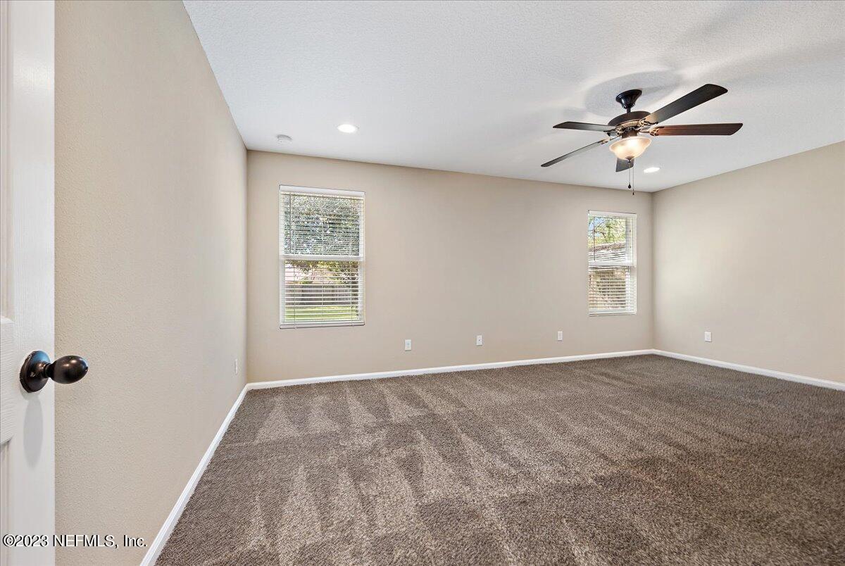 5418 Manfields Place Jacksonville, FL 32207 - Photo 11 of 21 a view of an empty room with a window