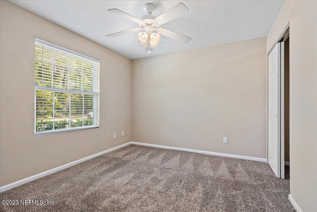 5418 Manfields Place Jacksonville, FL 32207 - Photo 16 of 21 a view of an empty room with a window