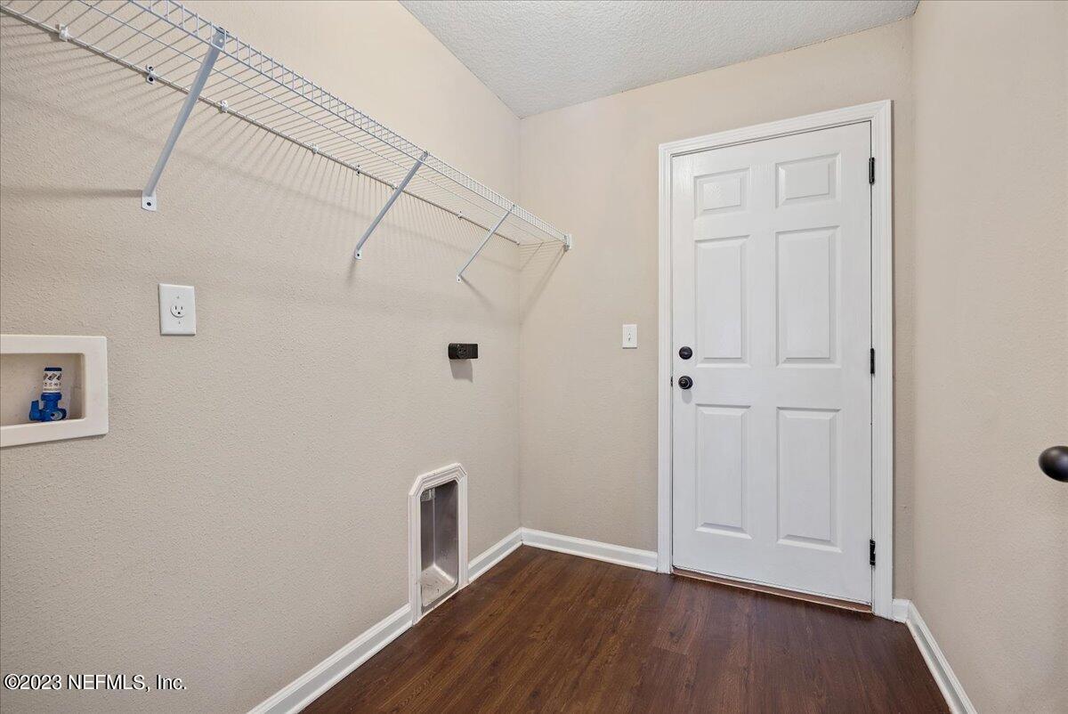 5418 Manfields Place Jacksonville, FL 32207 - Photo 19 of 21 a view of small space with wooden floor