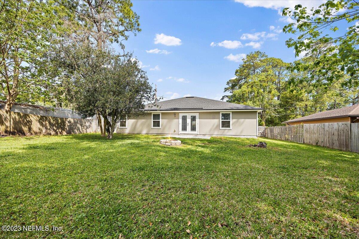 5418 Manfields Place Jacksonville, FL 32207 - Photo 21 of 21 a front view of a house with a garden