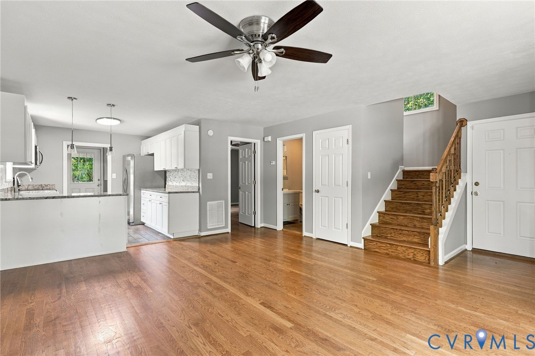 1626 Oak Ridge Road Appomattox, VA 24522 - Photo 11 of 30 Hardwood flooring throughout, a modern ceiling fan