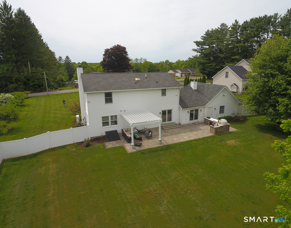 109 Harrison Lane Bethlehem, CT 06751 - Photo 13 of 28 a view of a house with backyard porch and sitting area