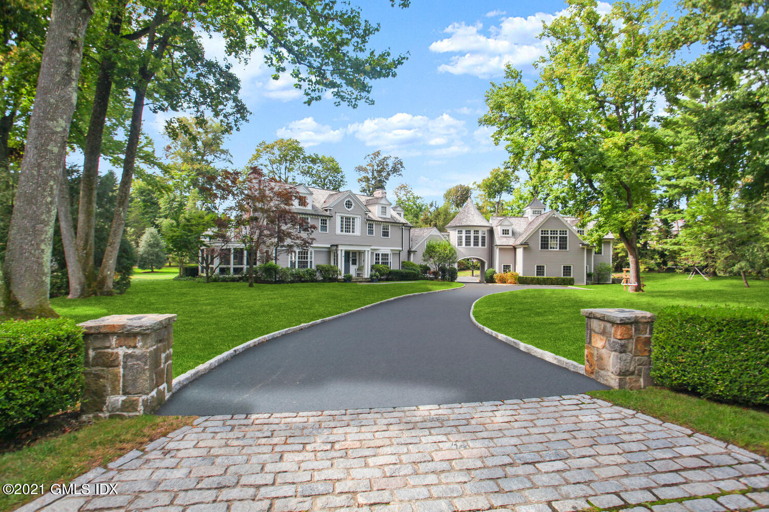 a view of yard with swimming pool and green space