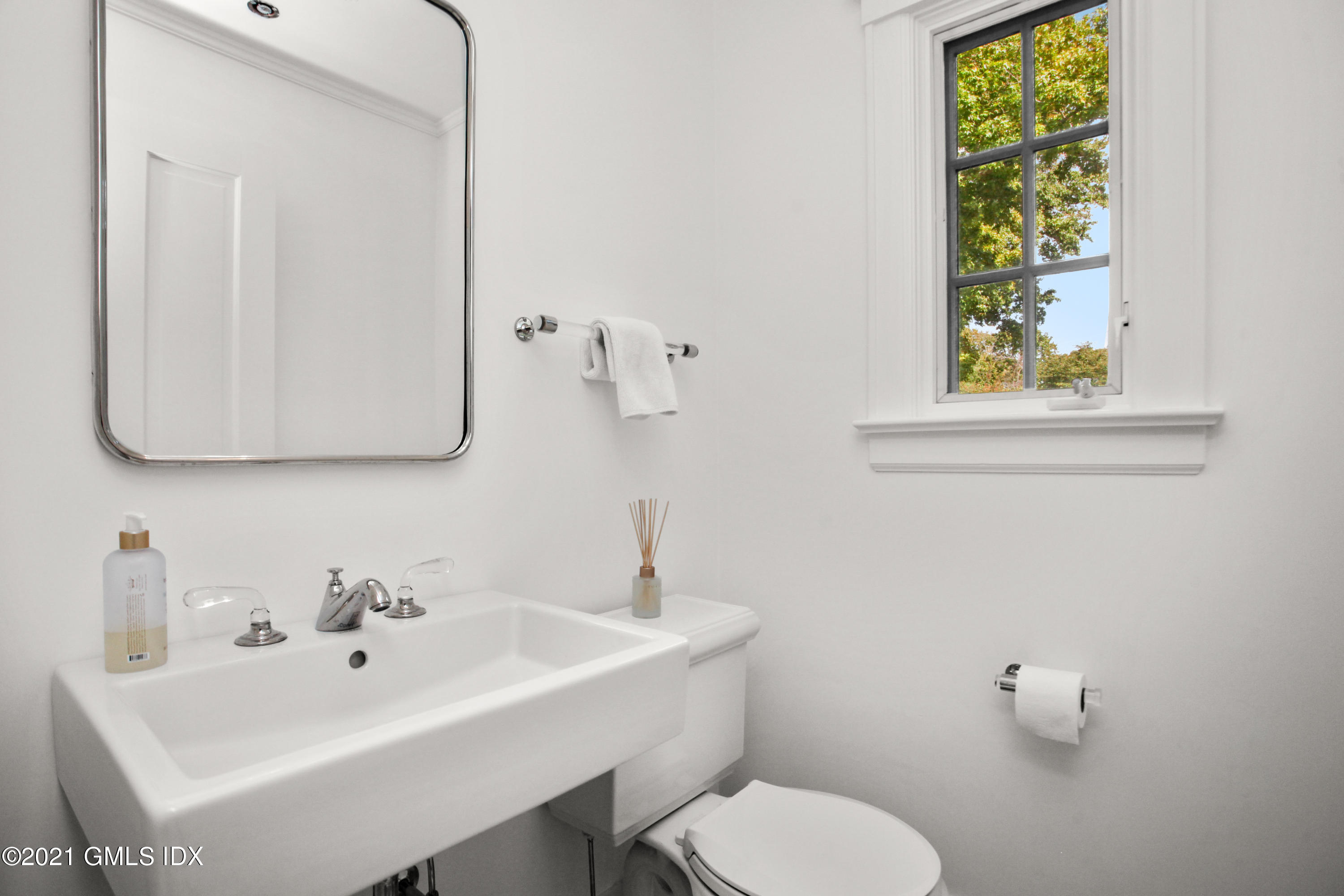 8 Cathlow Drive Riverside, CT 06878 - Photo 13 of 44 a bathroom with a sink mirror and toilet