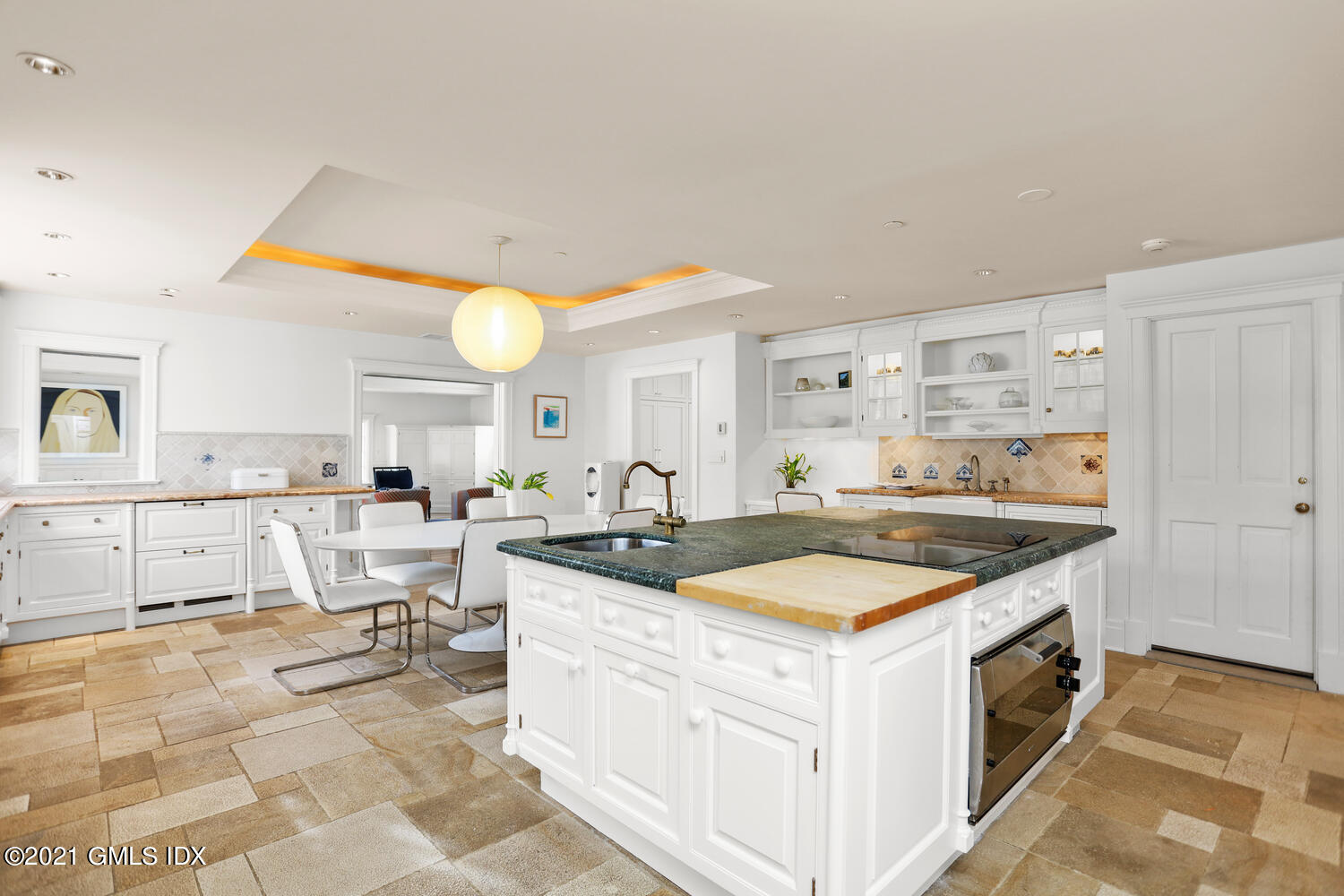 8 Cathlow Drive Riverside, CT 06878 - Photo 16 of 44 a kitchen with a sink and chairs